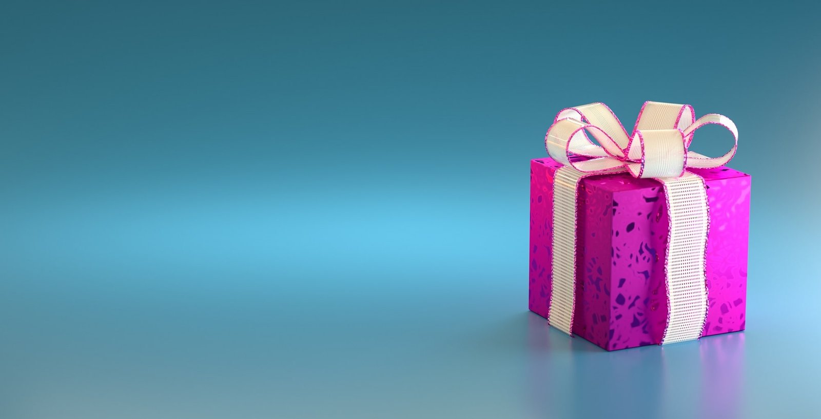 violet-gift-box-with-white-ribbon-blue-background-copy-space-text-min-min